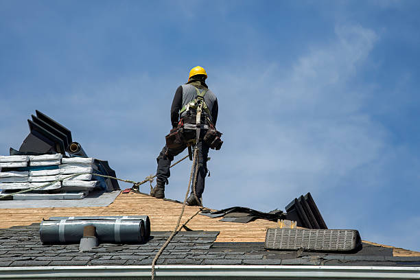 Professional Roof Replacement technician working in Tracy, IA